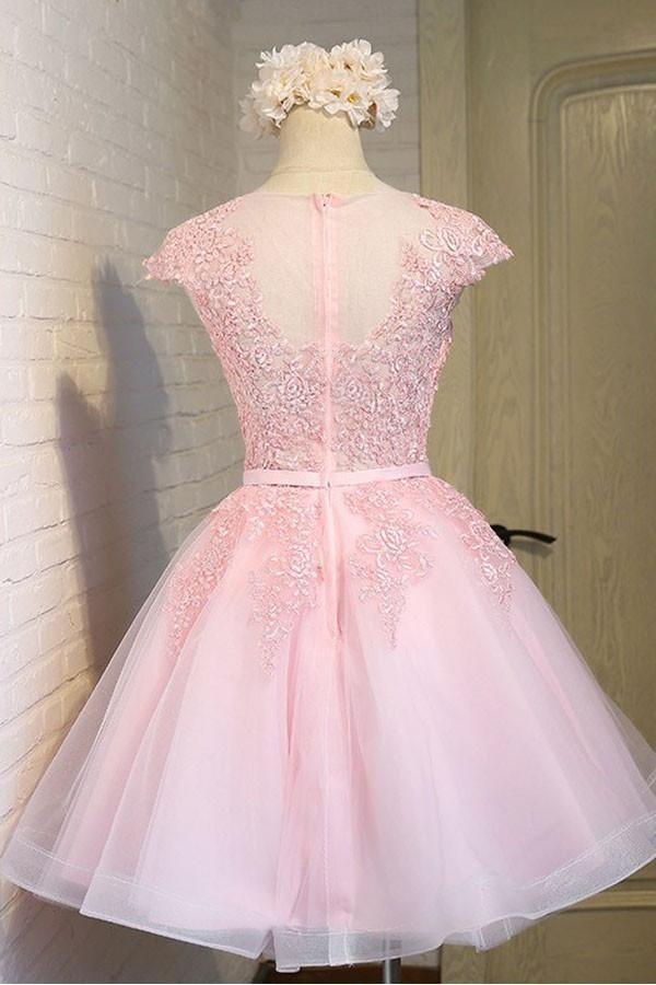 Close-up of pink A-line lace and tulle short dress details.