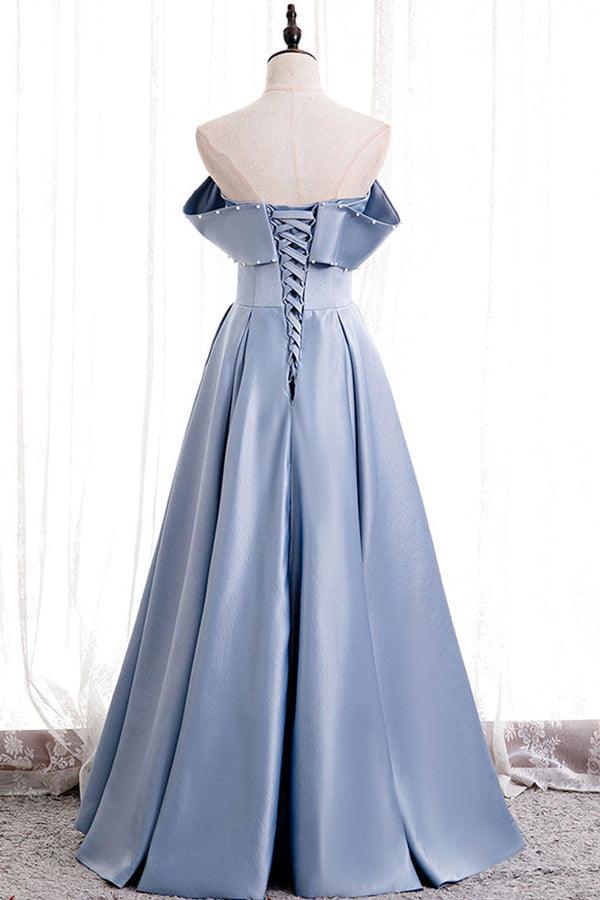 A-line off-shoulder prom dress with beading detail.