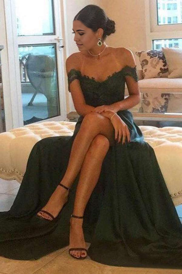 Full view of the dark green A-line off-shoulder gown.