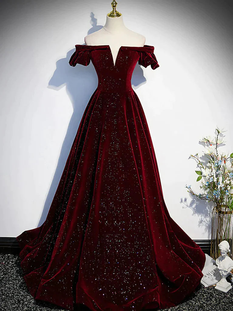 Model wearing an elegant A-line off-shoulder long prom dress.