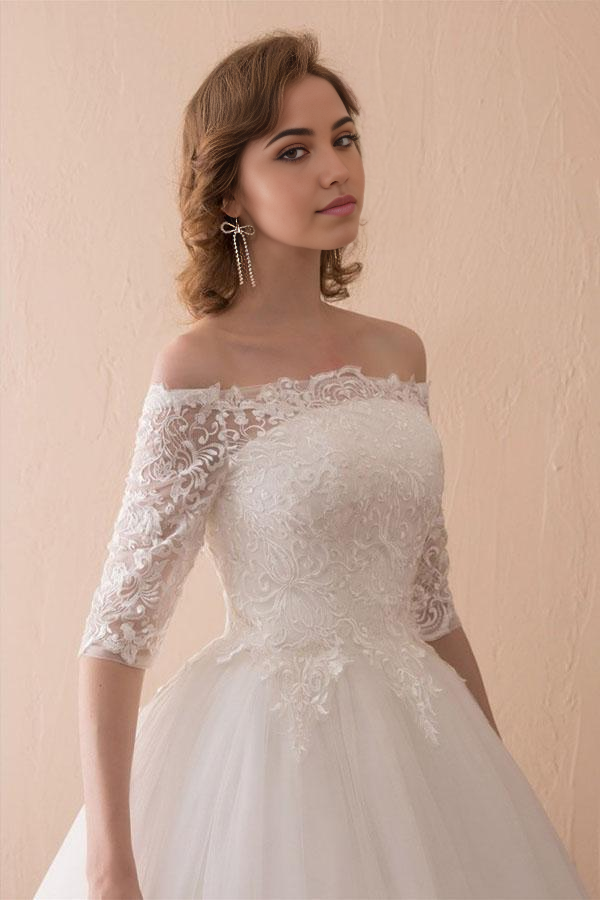 Back view of the A-line off-shoulder lace ball gown wedding dress.