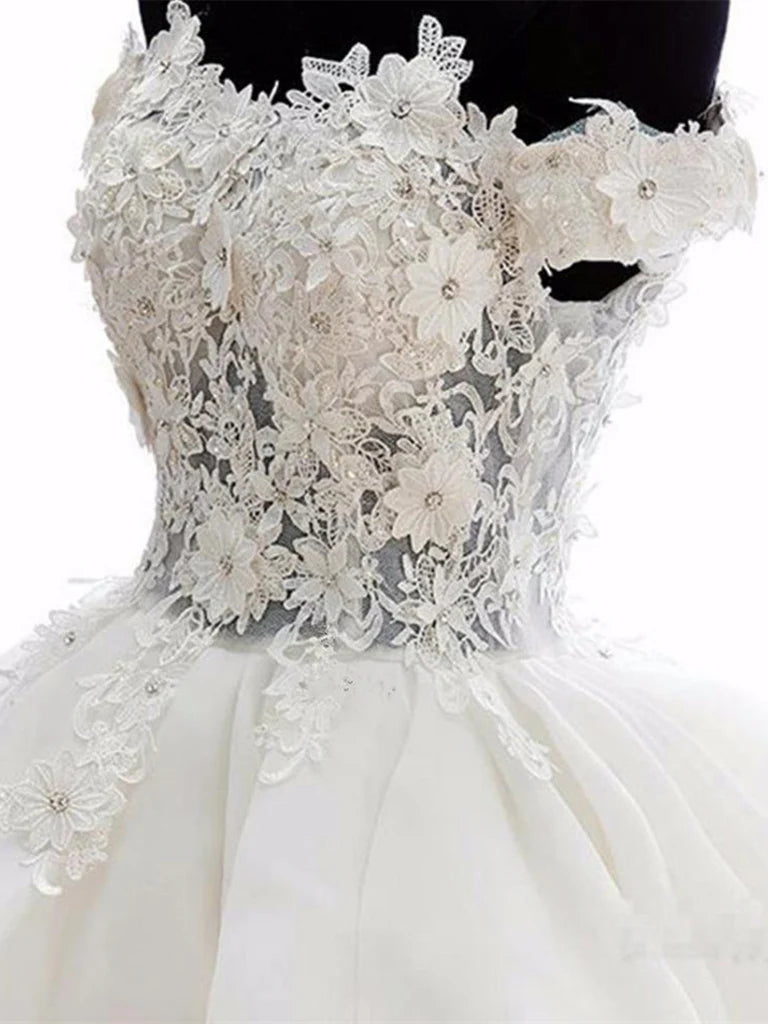 Back view of the short lace off-shoulder dress.