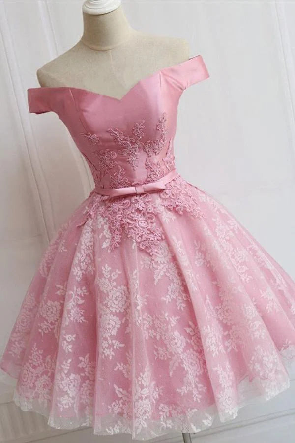 Back view of the A-line off-shoulder tulle dress, showcasing applique details.