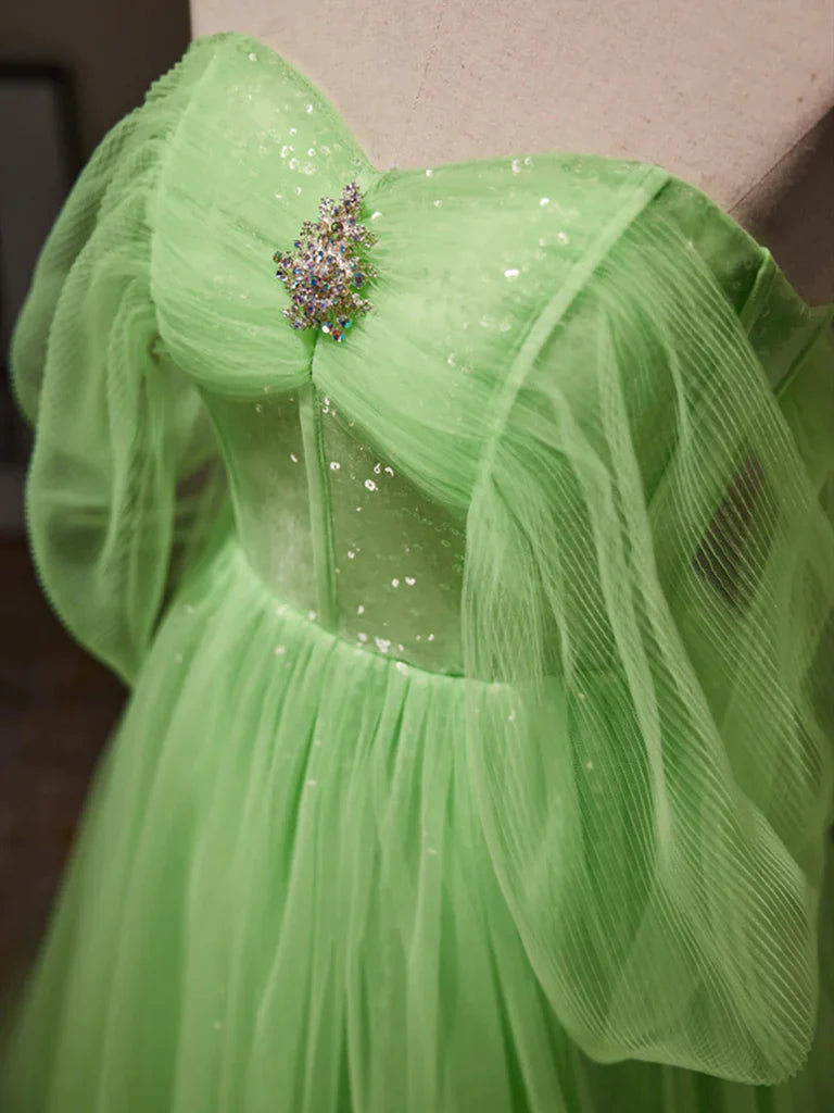 Side view of the elegant A-line off-shoulder tulle long prom dress.