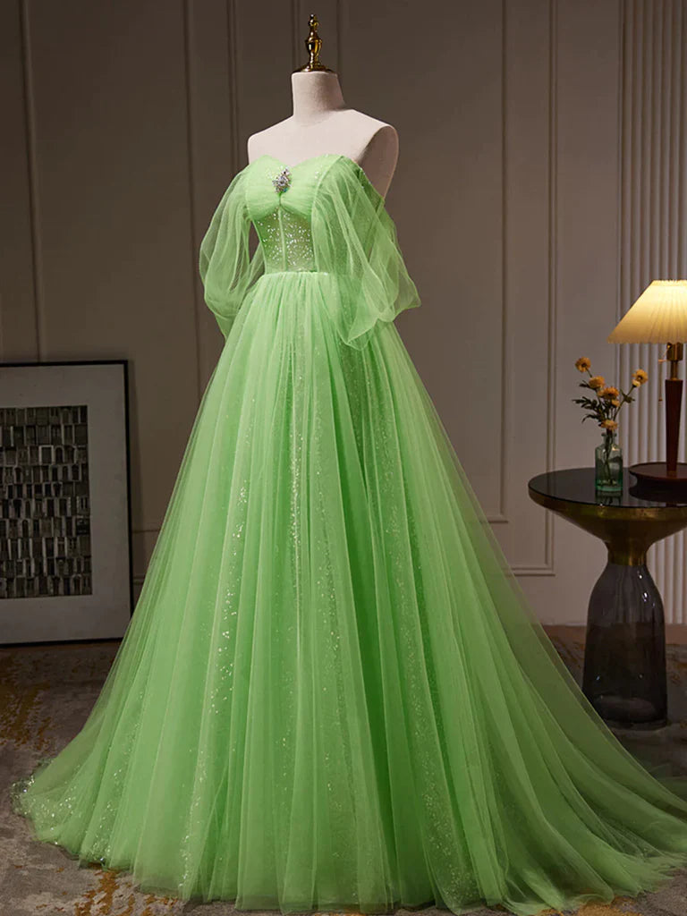 Close-up of the off-shoulder sweetheart neckline and delicate tulle fabric.