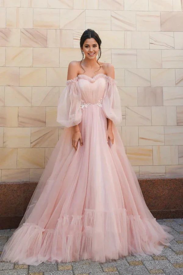 A-line off-shoulder sweetheart tulle wedding dress with poet sleeves.