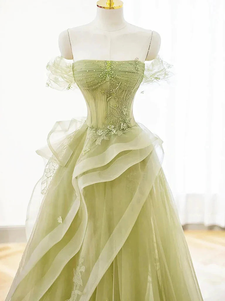Elegant A-line off-the-shoulder prom dress with beaded tulle.