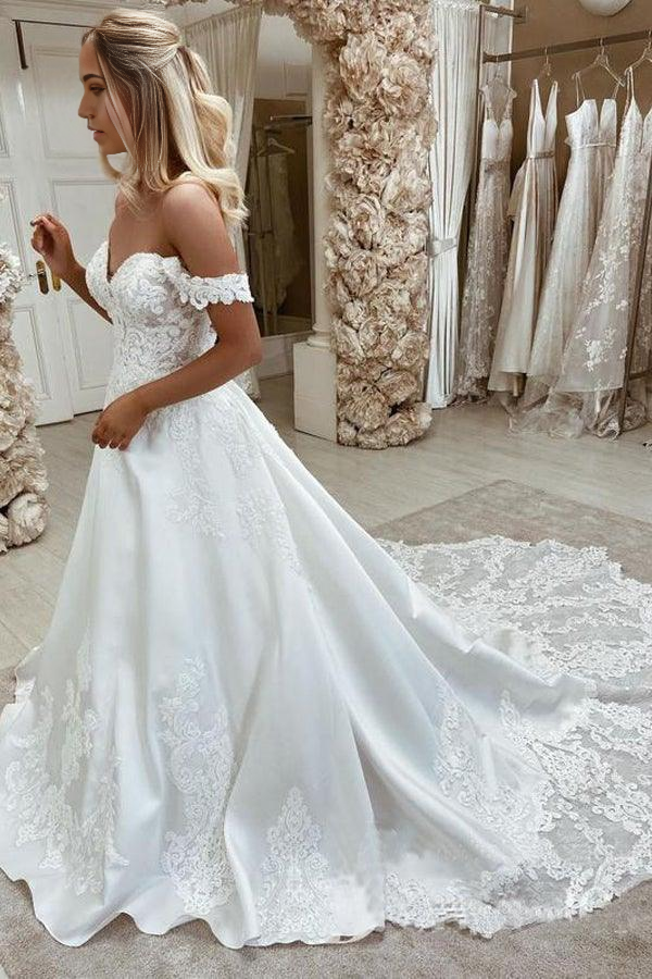 Elegant A-line off-the-shoulder satin wedding dress with appliques.