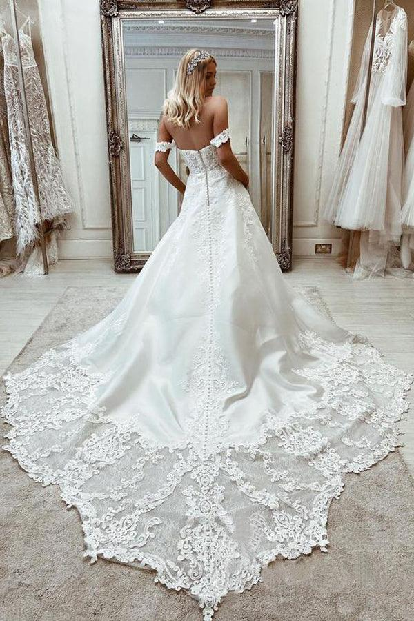 Back view of an A-line off-the-shoulder satin wedding dress with appliques.