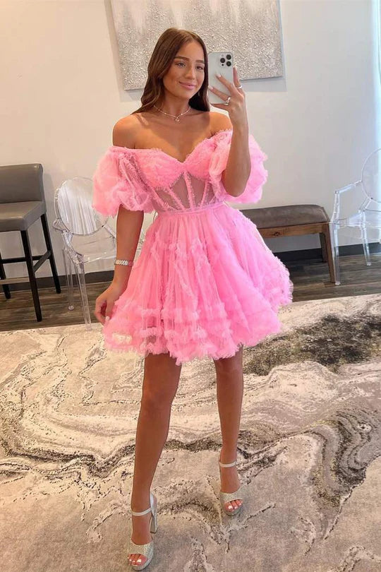 Close-up of tulle ruffles on an off-the-shoulder homecoming dress.