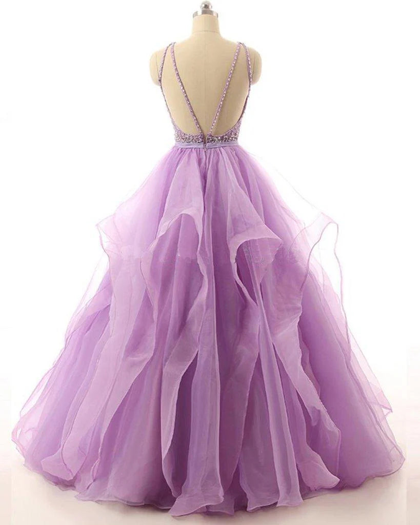 Close-up of the beaded sweetheart bodice and A-line silhouette of the organza formal gown.