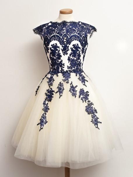A-line round neck sleeveless short lace dress for prom or homecoming.