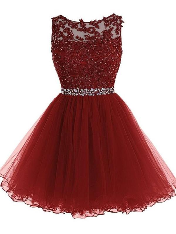 Model wearing a short A-line burgundy lace dress with a round neck, suitable for prom or homecoming.