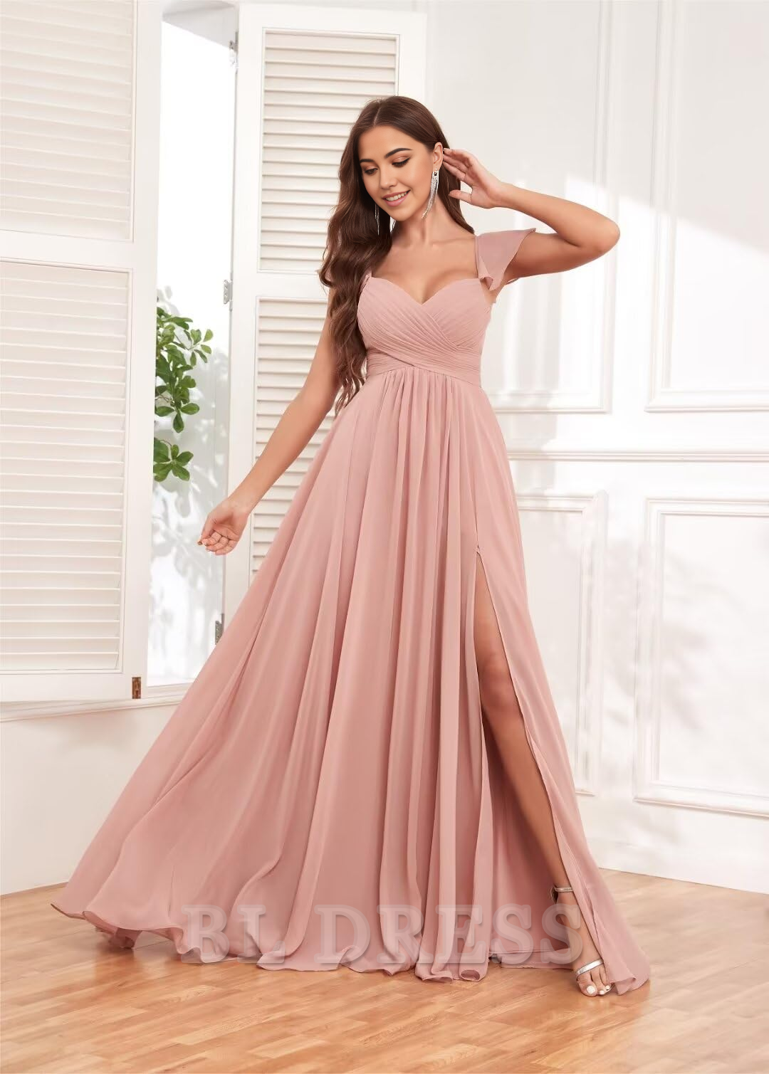 Side view of a long A-line dress featuring a high slit and pockets.
