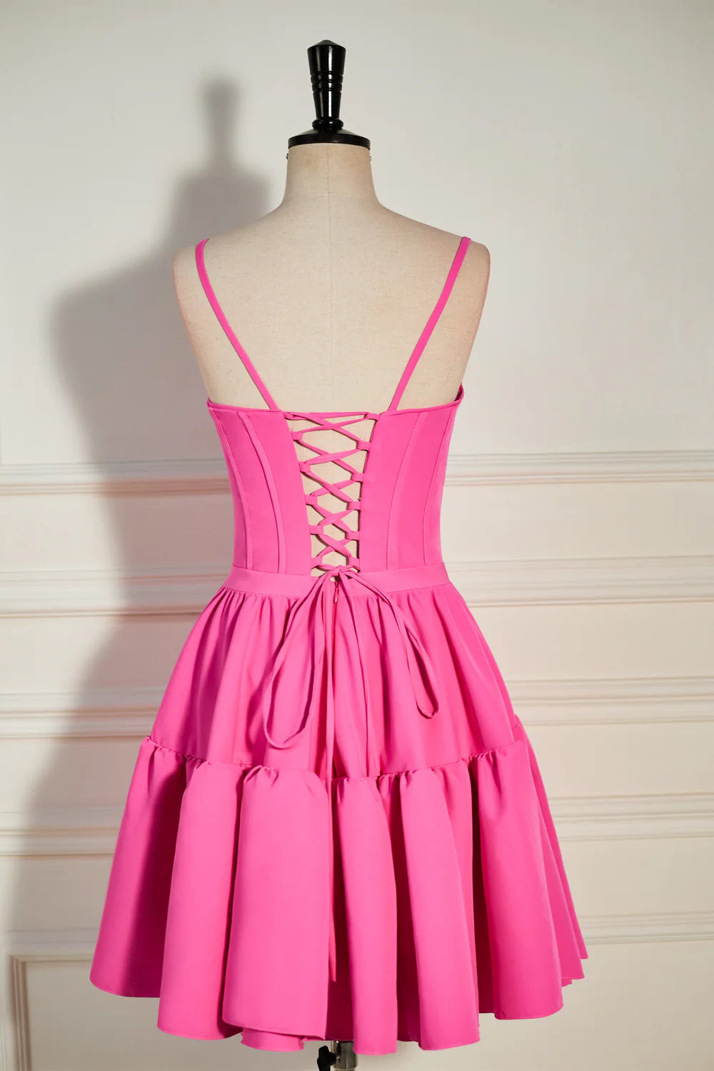 Close-up of ruffled skirt detail on the short A-line dress.
