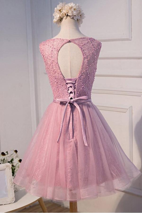 Close-up of the beaded details on the short tulle A-line homecoming dress.