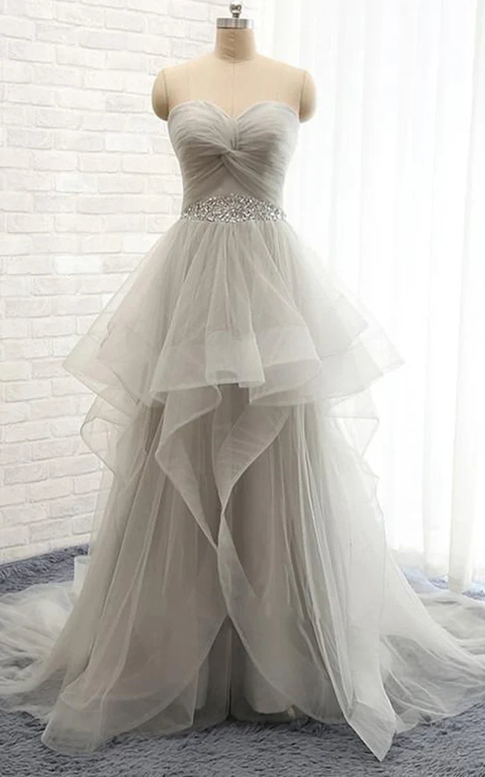 Elegant A-line scoop neck wedding dress with intricate beading.