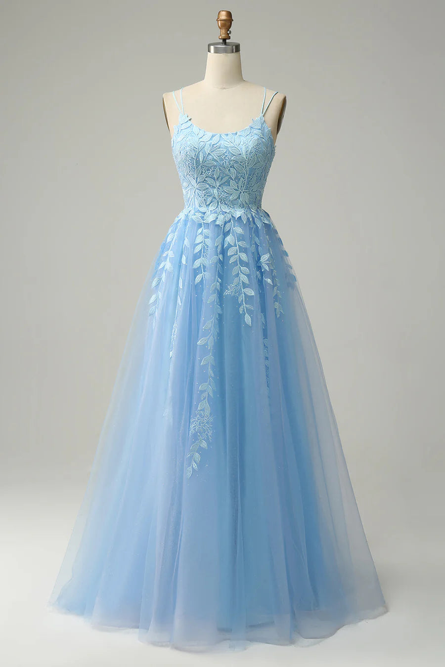 Elegant A-line prom dress with scoop neckline and intricate embroidery.