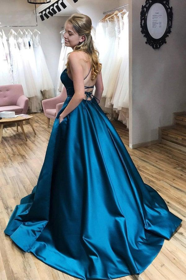 Back view of A-line prom dress showing cross straps.