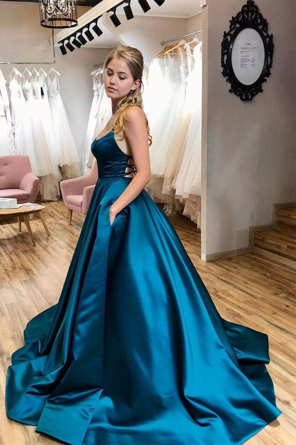 Side view of A-line prom dress with pockets.