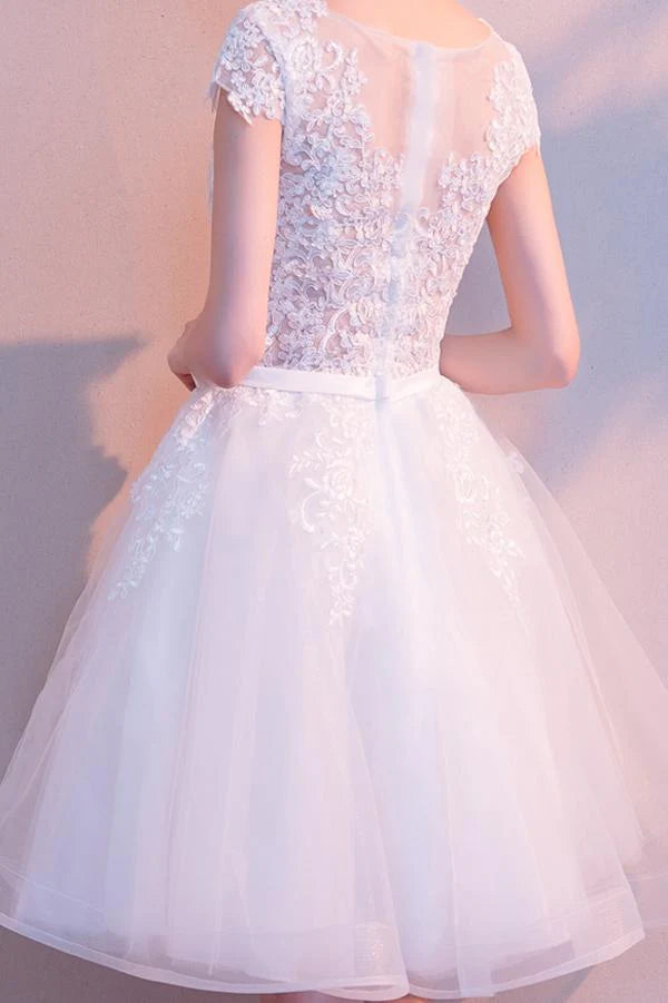 Back view of the A-line tulle lace homecoming dress with intricate appliques.