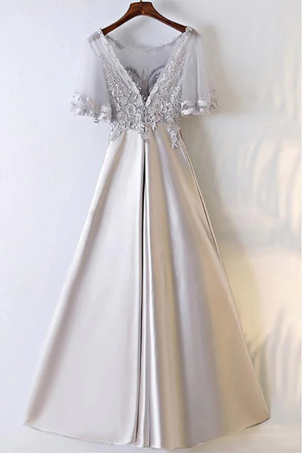 Back view of the A-line satin formal dress with a flowing silhouette.