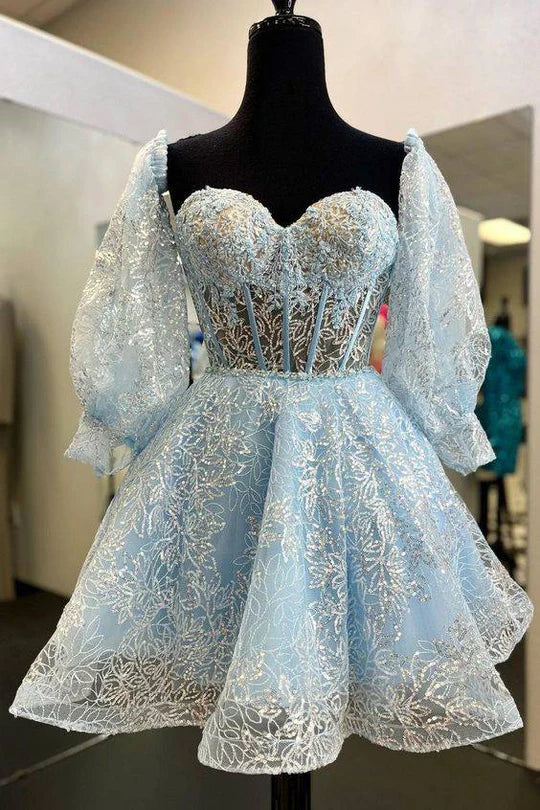 Elegant A-line strapless homecoming dress with delicate floral appliques.