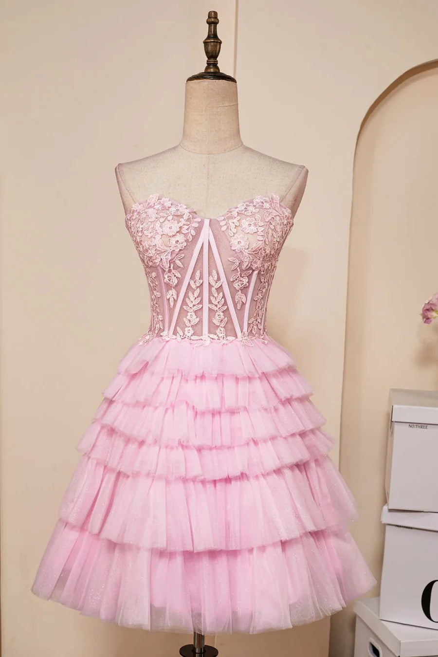 Elegant A-line strapless homecoming dress with appliques and multi-layers.