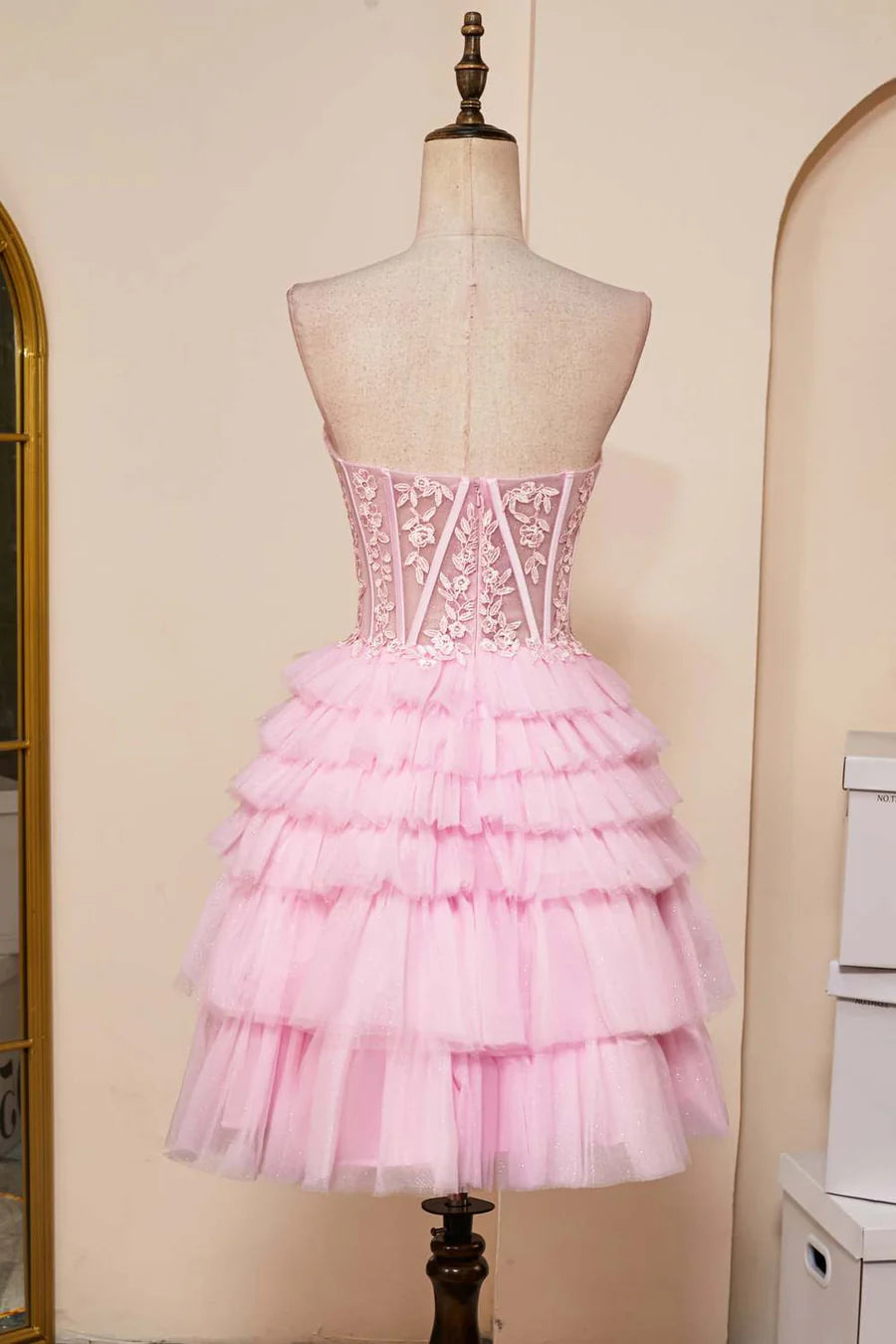 Side view of the periwinkle A-line homecoming dress.