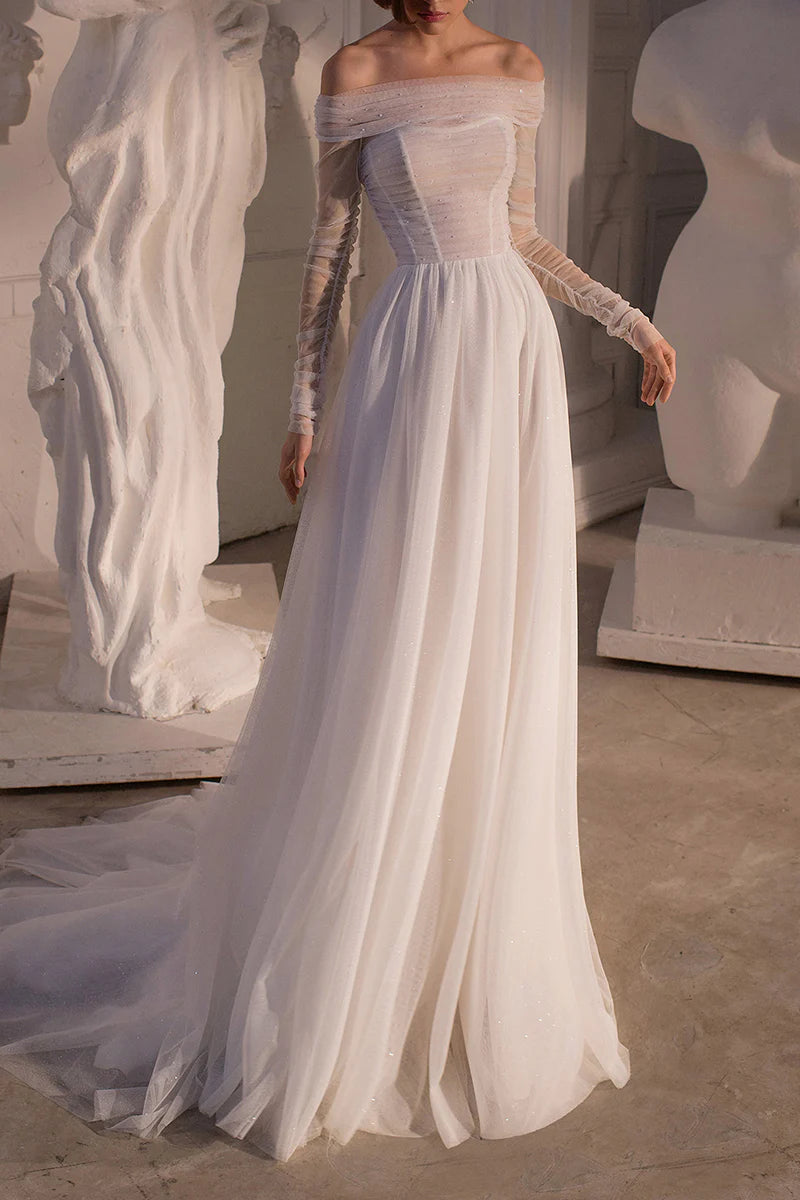 Elegant A-line strapless wedding dress with a sweep train, front view.