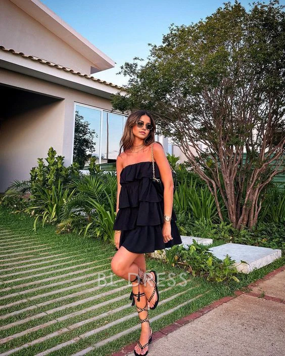 Elegant black A-line strapless maxi dress, perfect for formal events and prom.