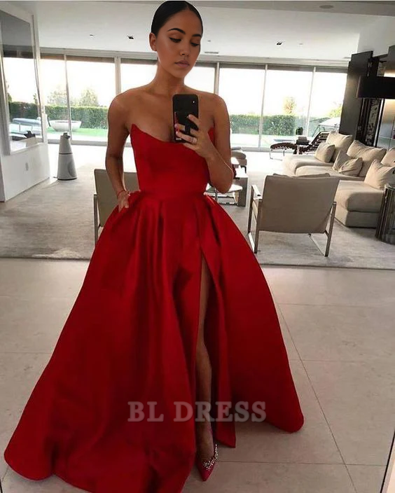 Red A-line strapless satin gown with a high slit.