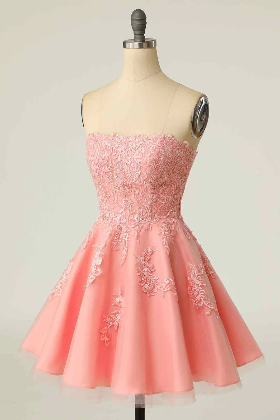 Side view of short A-line strapless party dress.