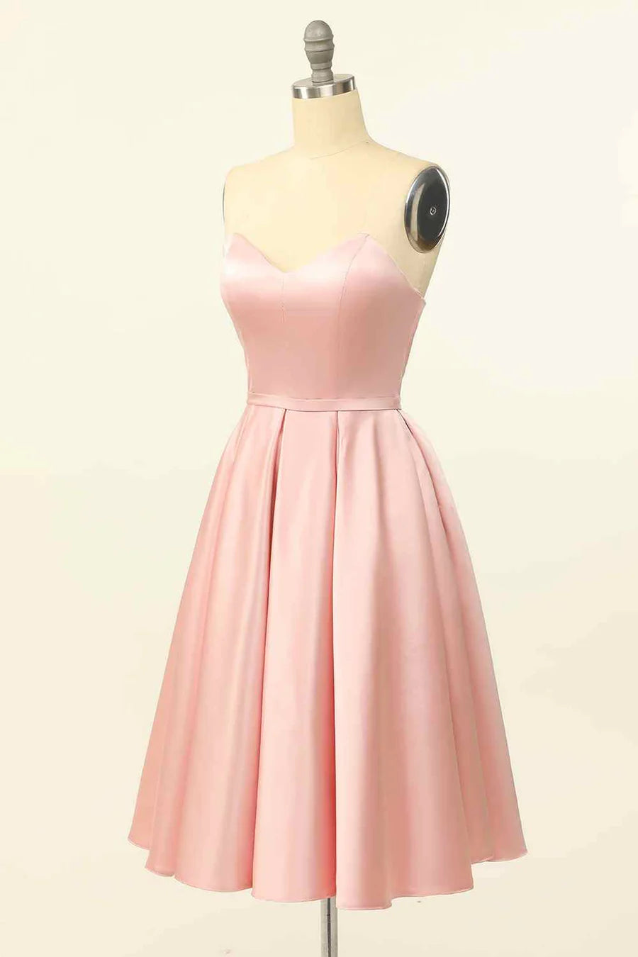 Side view of the elegant strapless satin mini dress.