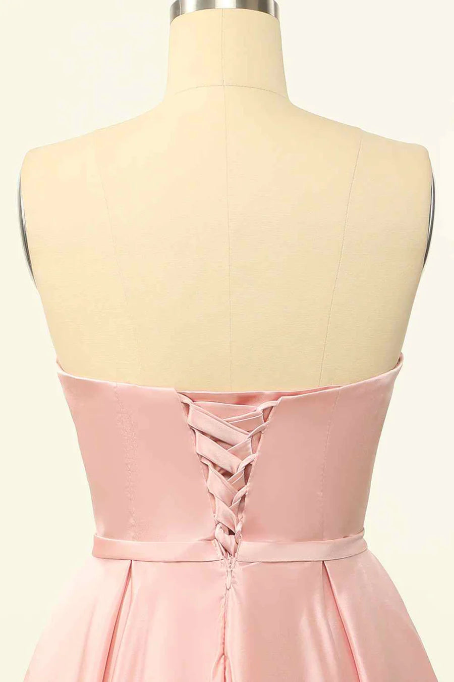 Full view of the A-line strapless satin mini dress.