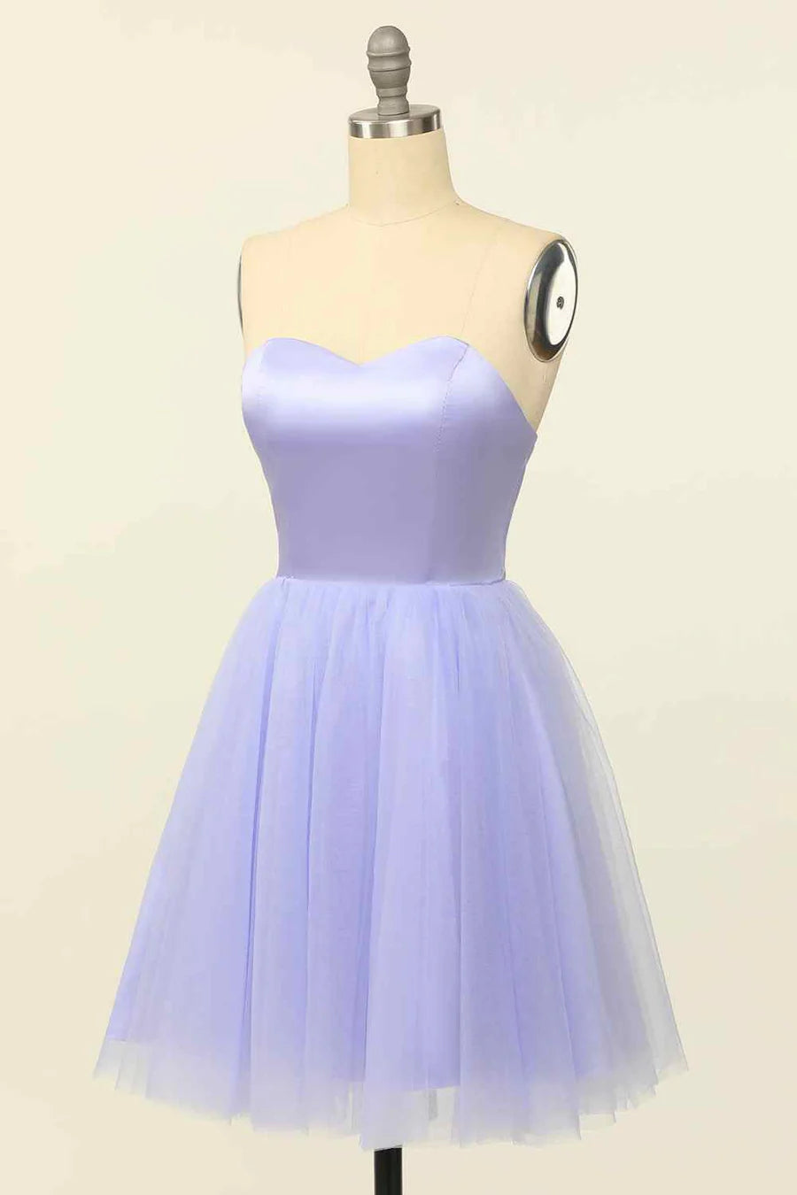 Close-up of sweetheart neckline and bodice of mini dress.