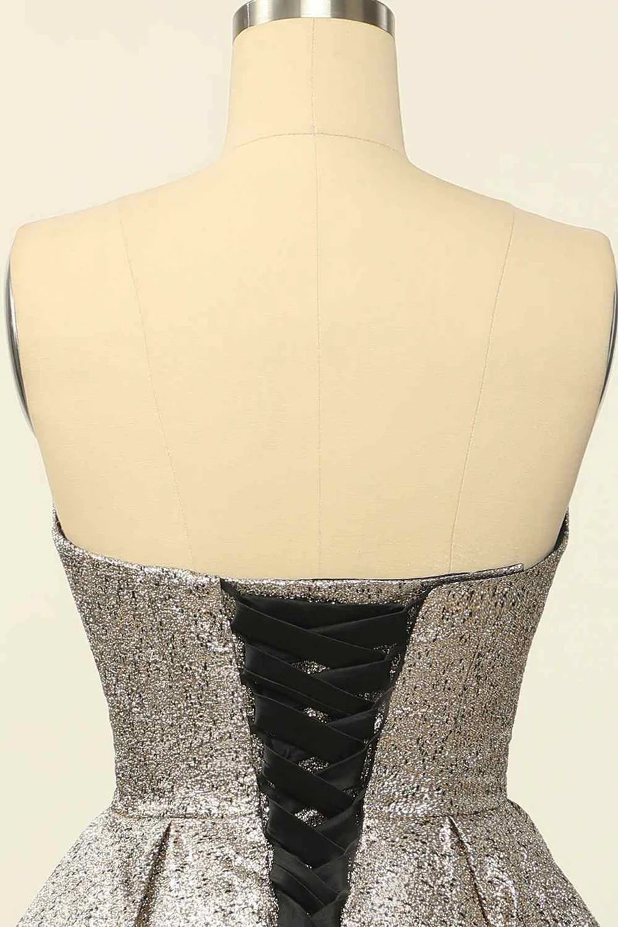 Back view of mini homecoming dress showing lace-up detail.