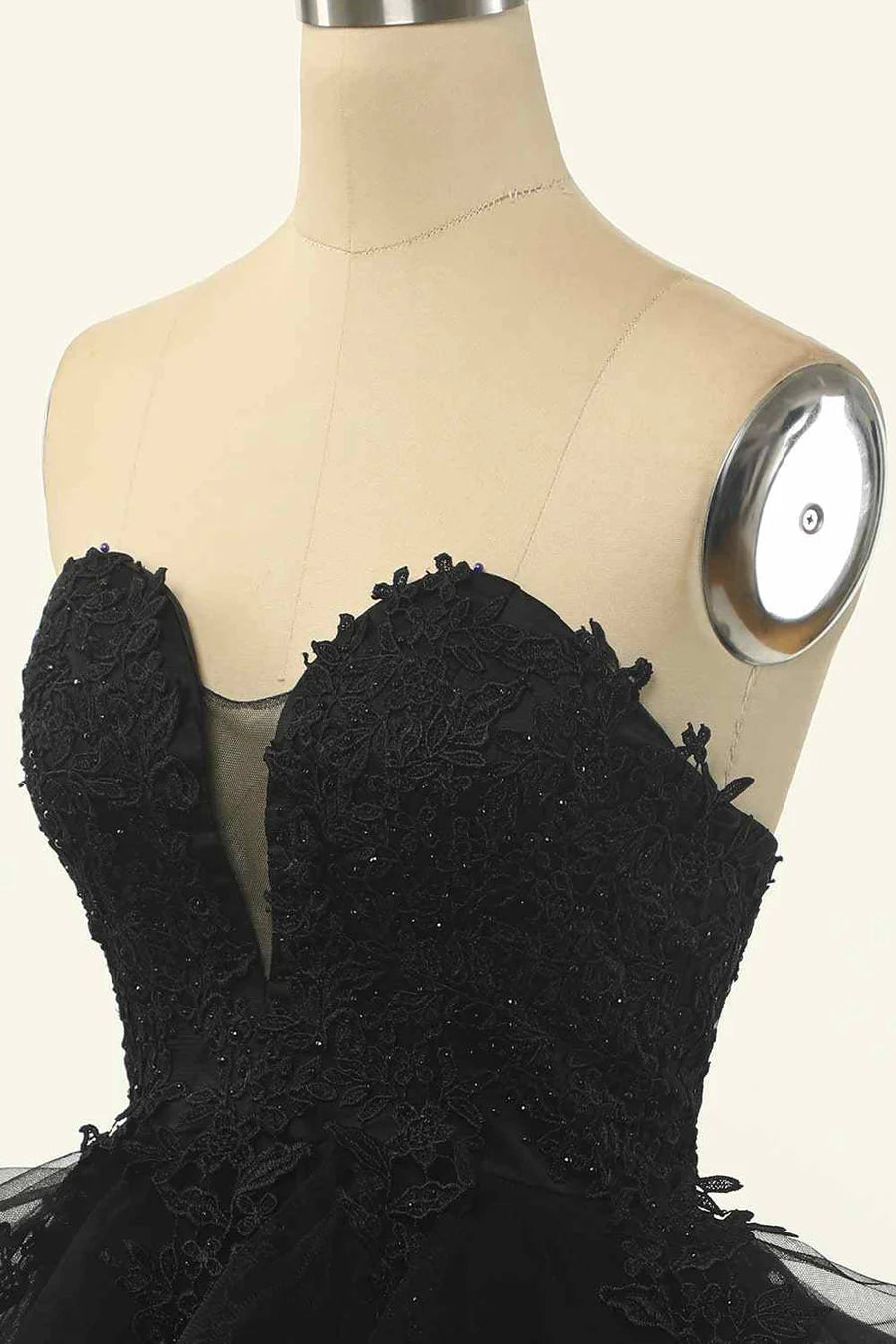Close-up of delicate applique on the bodice of the homecoming dress.
