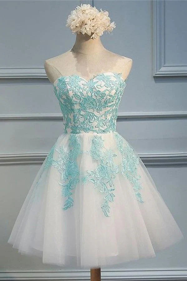 A-line sweetheart homecoming dress with appliques and open back.