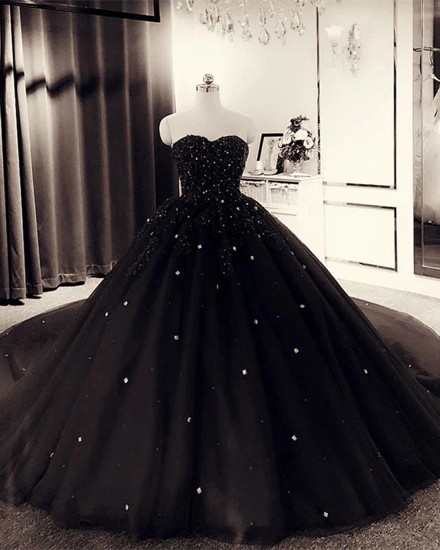 Black A-line sweetheart ball gown with crystal beading.