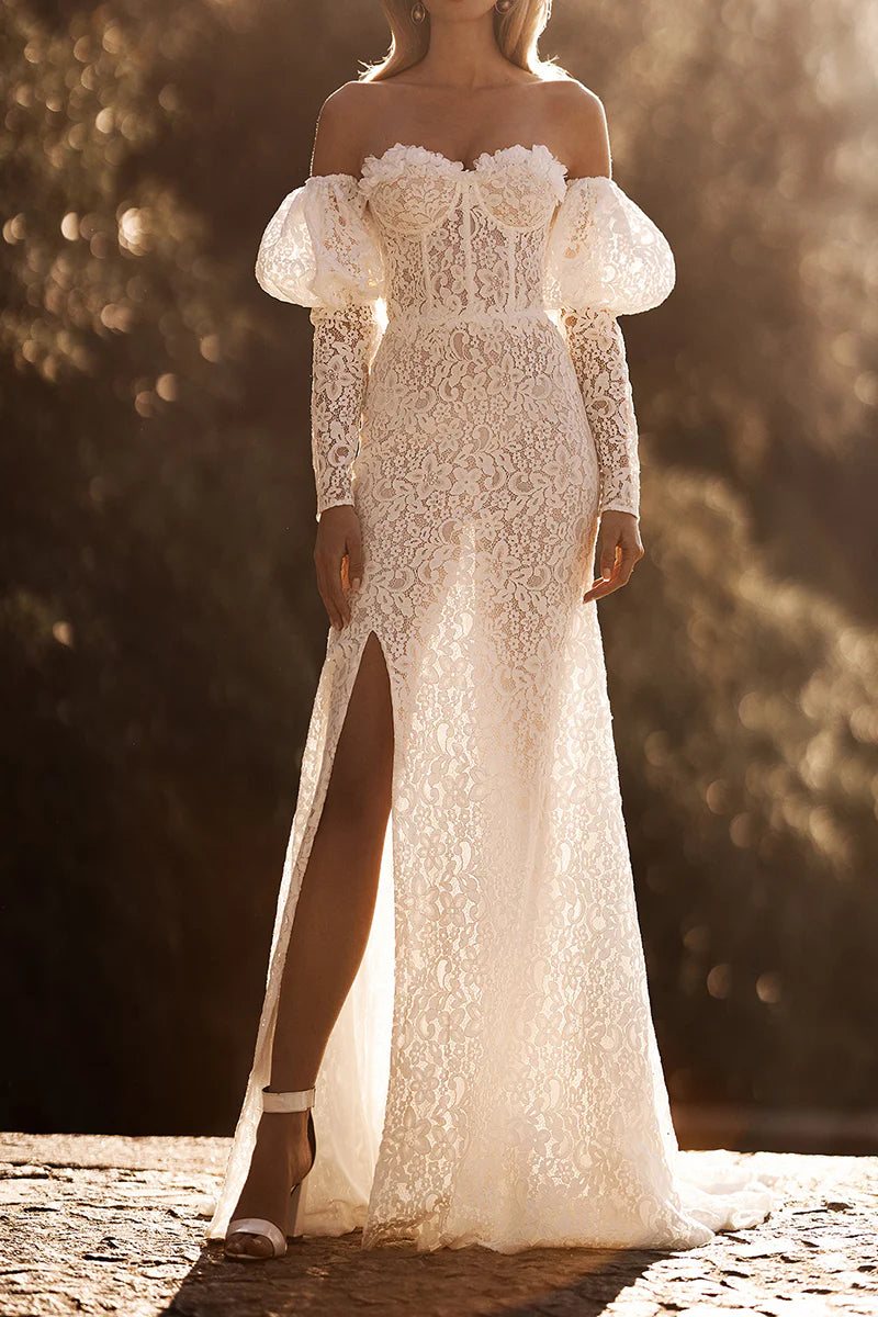 Close-up of lace detail on a sweetheart wedding dress sleeve.