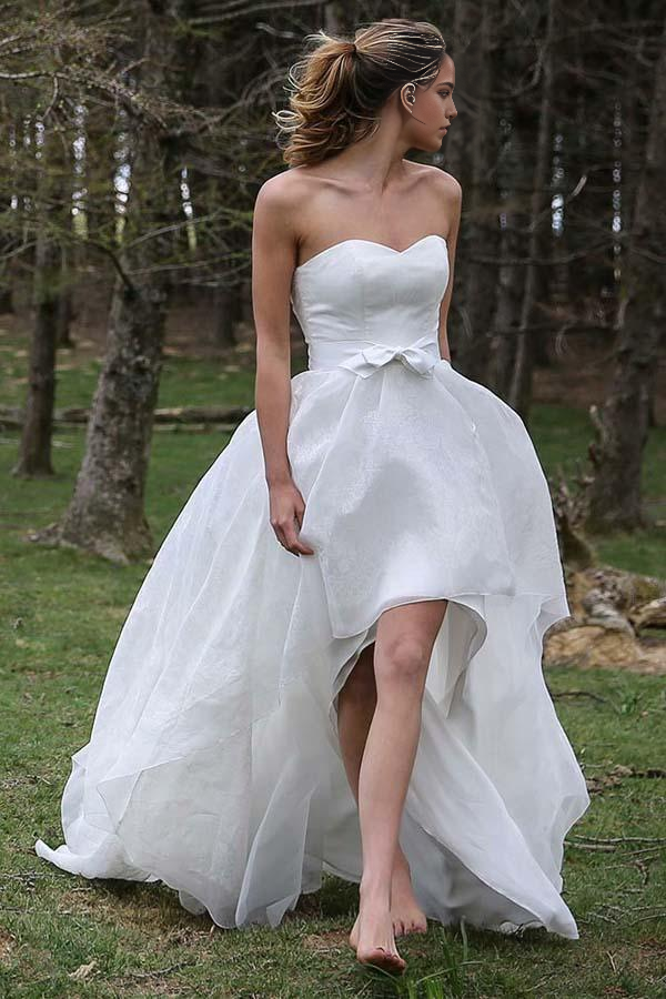 Elegant A-line wedding dress with sweetheart neckline and high-low hem.