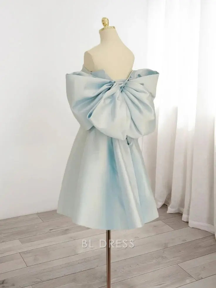 Close-up of the blue A-line sweetheart satin dress, showing fabric detail.