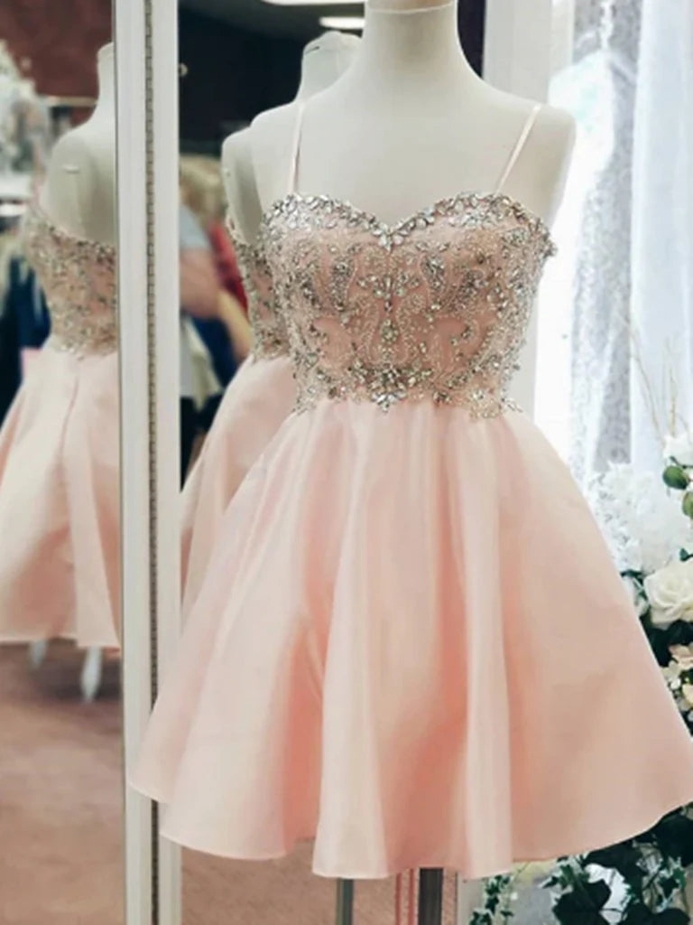 Model wearing an A-line sweetheart satin rhinestone short homecoming dress.