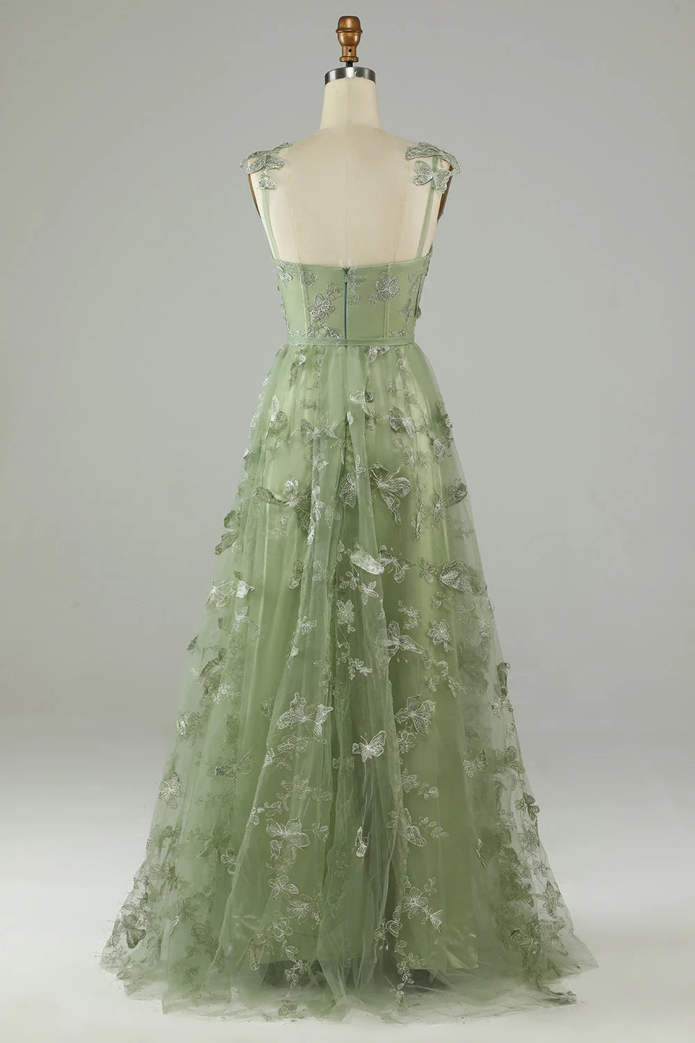 Green A-line prom dress with sweetheart neckline and 3D butterfly details.