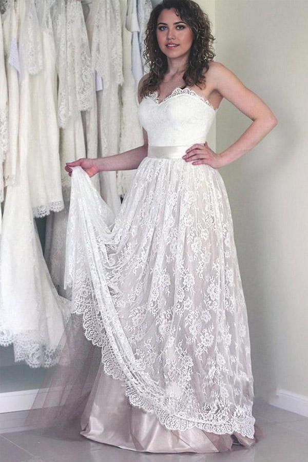 Elegant A-line sweetheart sleeveless white lace wedding dress.