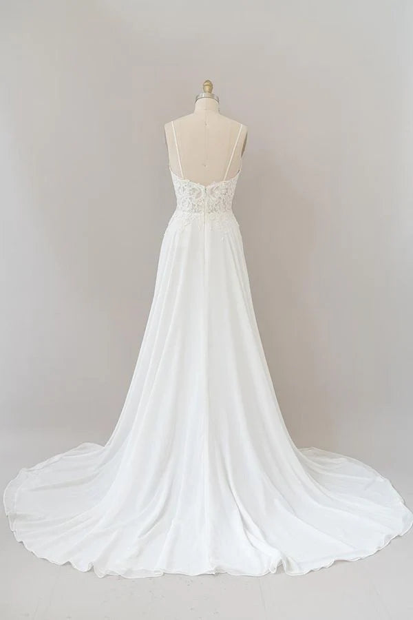 Back view of A-line chiffon wedding dress with delicate appliques.