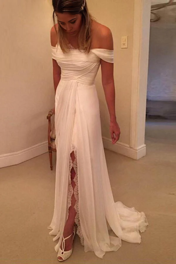 Side view of long A-line strapless wedding dress.