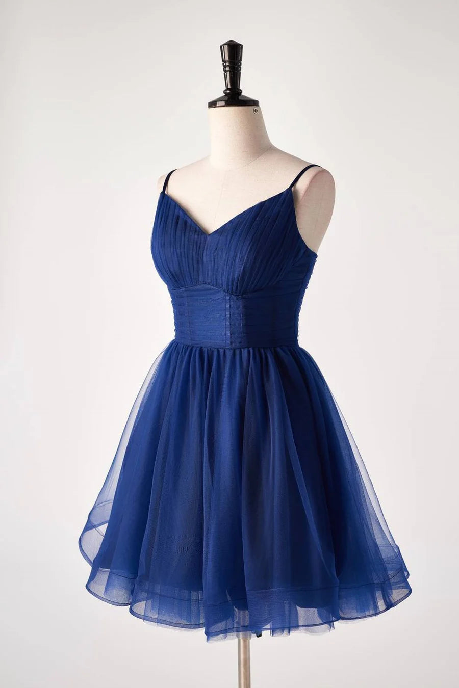 Close-up of appliques on a sweetheart tulle homecoming dress.