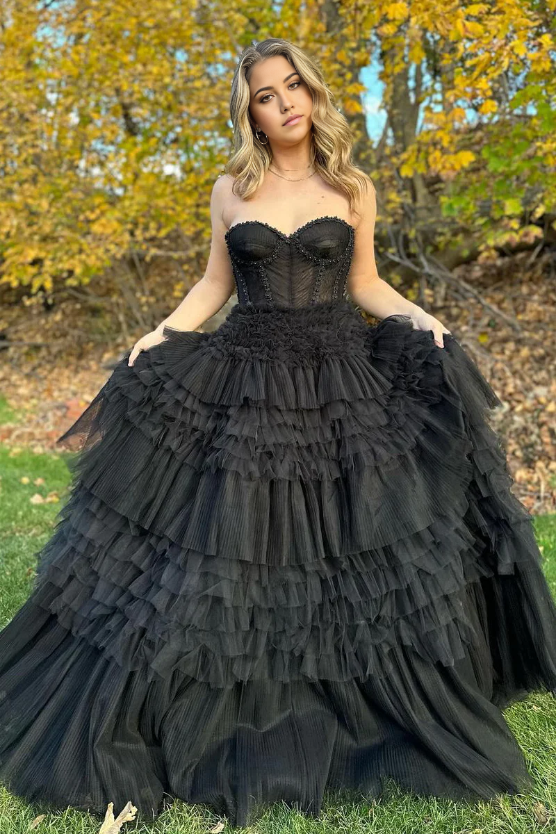 Black A-line tulle prom dress with sweetheart neckline.